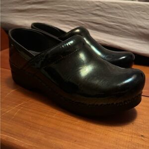 Dansko Shiny green clogs